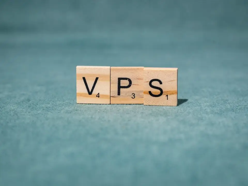 Wooden letters 'VPS' on green background